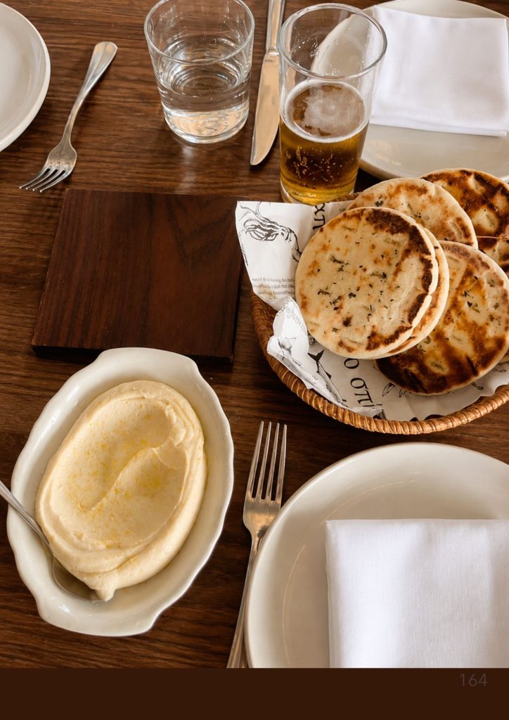 Pita bread, dips and a beer at Greca on the Brisbane riverfront