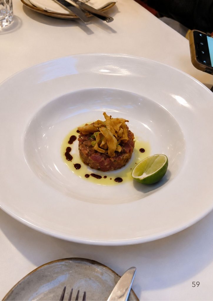 A plated fine dining course with lime at a Gold Coast restaurant