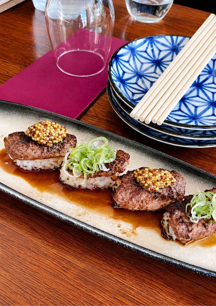 Sesame-crusted beef at a contemporary Asian restaurant in Brisbane